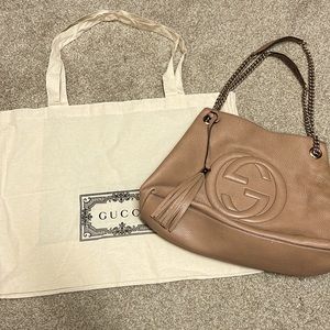 Used but in very good condition…a few worn  spots no torn areas authentic Gucci